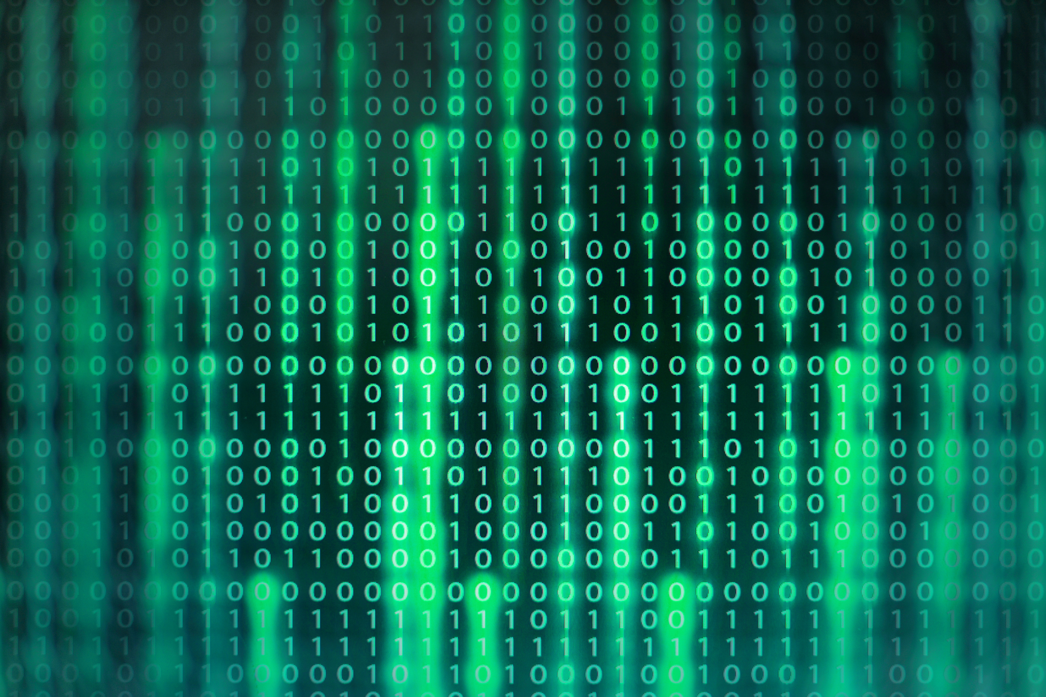 power of big data. binary code information bit on computer monitor screen display. Led light text number one and zero. blur defocus blue bokeh light. technology graphic design background concepts